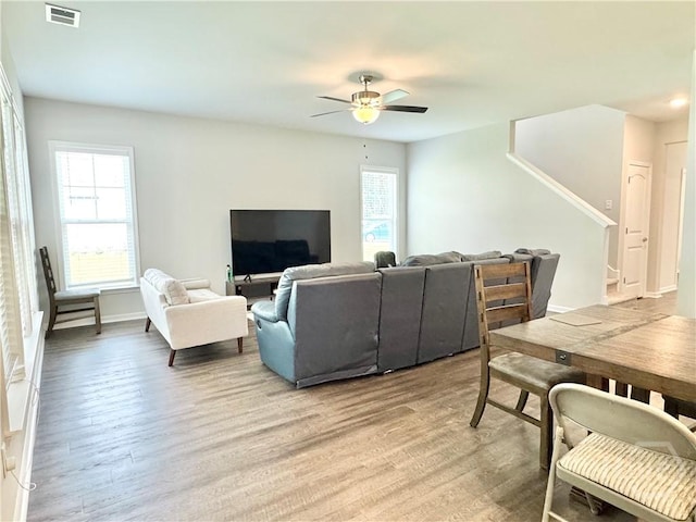 134 Melody Dr, Pooler, GA 31322 - living room with plenty of natural light, wood finished floors, and a ceiling fan