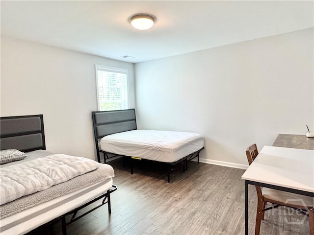 134 Melody Dr, Pooler, GA 31322 - bedroom featuring light wood-type flooring and baseboards