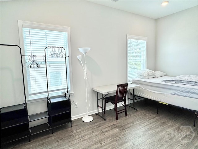 134 Melody Dr, Pooler, GA 31322 - bedroom featuring wood finished floors and multiple windows