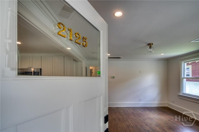 2125 Atlantic Ave, Savannah, GA 31401 - hall featuring ornamental molding, wood finished floors, and recessed lighting