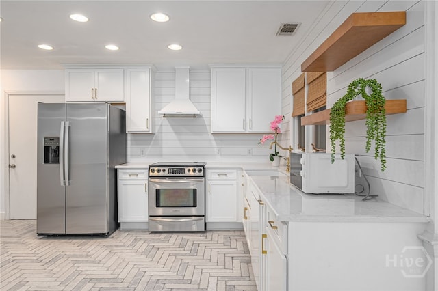 9 Bowline Ct, Savannah, GA 31411 - kitchen featuring appliances with stainless steel finishes, premium range hood, open shelves, white cabinets, and recessed lighting