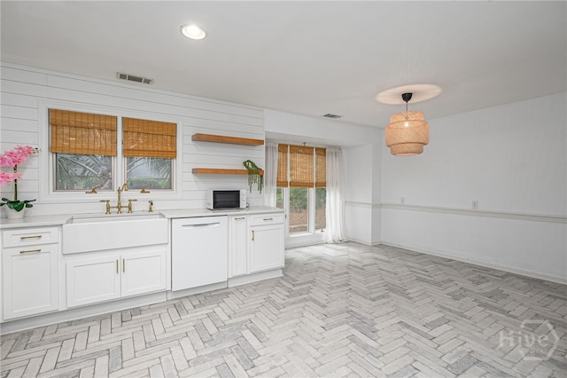 9 Bowline Ct, Savannah, GA 31411 - kitchen with white appliances, light countertops, white cabinets, open shelves, and hanging light fixtures