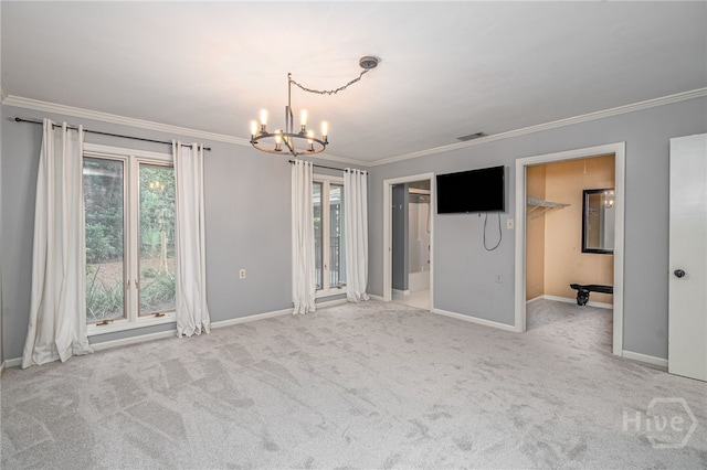 9 Bowline Ct, Savannah, GA 31411 - unfurnished bedroom with a chandelier, crown molding, carpet floors, and a spacious closet