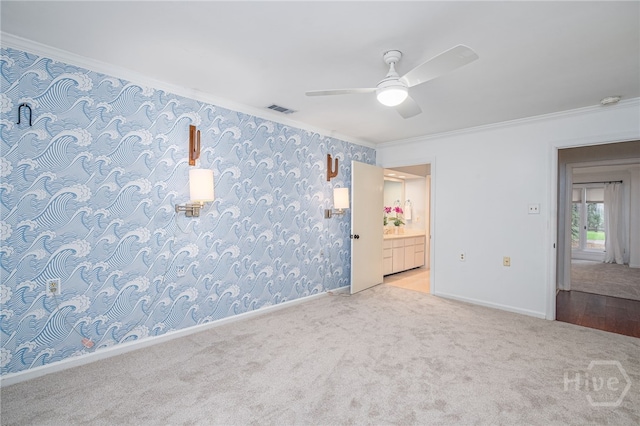 9 Bowline Ct, Savannah, GA 31411 - carpeted spare room with crown molding, ceiling fan, and a smoke detector