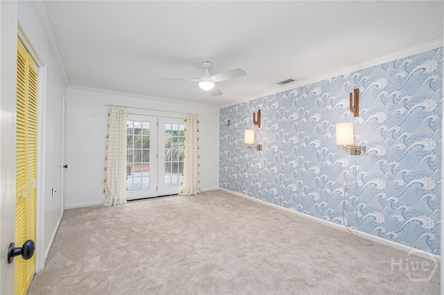 9 Bowline Ct, Savannah, GA 31411 - empty room featuring carpet, crown molding, a ceiling fan, and french doors