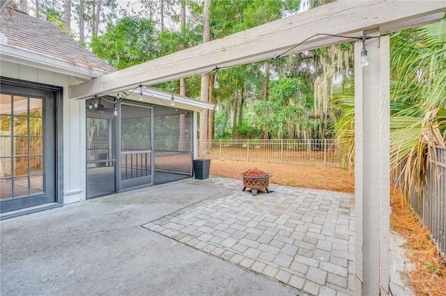 9 Bowline Ct, Savannah, GA 31411 - view of patio with a sunroom and an outdoor fire pit