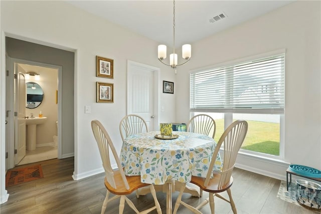 126 Chalk Farm Way, Bloomingdale, GA 31302 - dining room with wood finished floors, healthy amount of natural light, and a chandelier