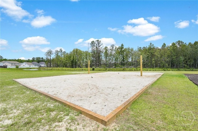 151 Guana Ln, Bloomingdale, GA 31302 - surrounding community featuring volleyball court and a yard