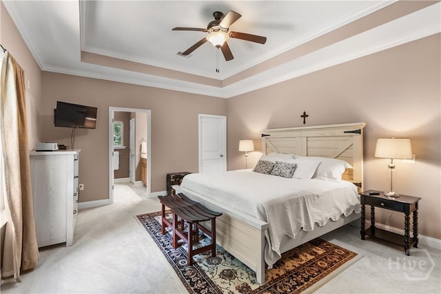 287 Sandpiper Rd, Midway, GA 31320 - bedroom featuring light colored carpet, a raised ceiling, crown molding, ceiling fan, and ensuite bath