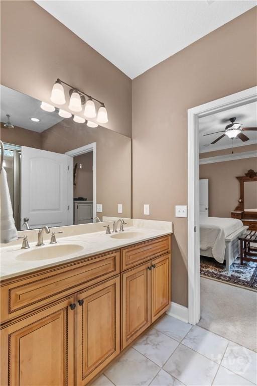 287 Sandpiper Rd, Midway, GA 31320 - bathroom featuring double vanity, a ceiling fan, and ensuite bath