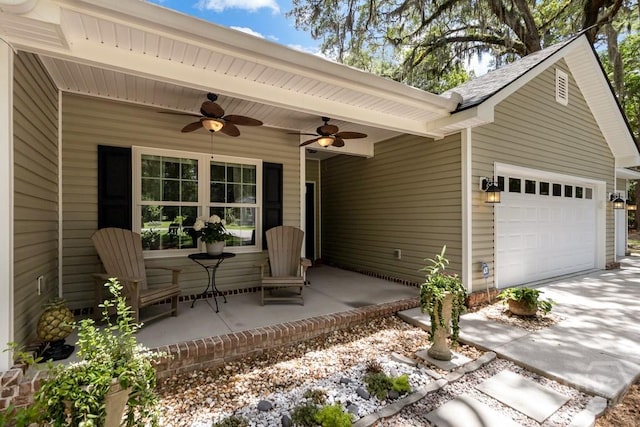 287 Sandpiper Rd, Midway, GA 31320 - view of patio featuring a garage, a ceiling fan, and concrete driveway
