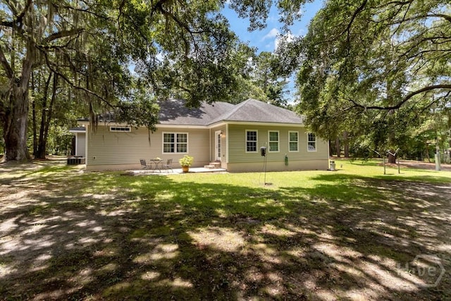 287 Sandpiper Rd, Midway, GA 31320 - view of front of property featuring a patio and a front yard