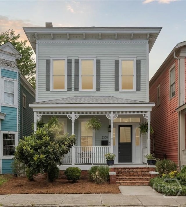 2309 Whitaker St, Savannah, GA 31401 - italianate-style house with a porch