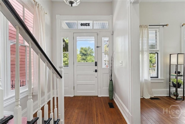 2309 Whitaker St, Savannah, GA 31401 - entrance foyer with dark wood finished floors and stairway