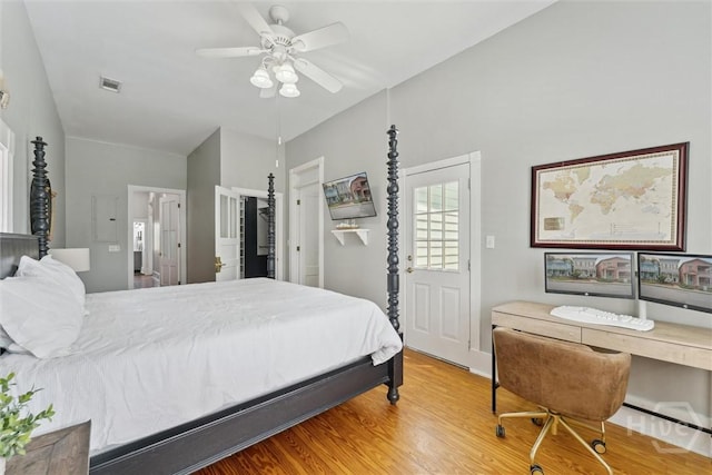 2309 Whitaker St, Savannah, GA 31401 - bedroom with wood finished floors, ceiling fan, and electric panel