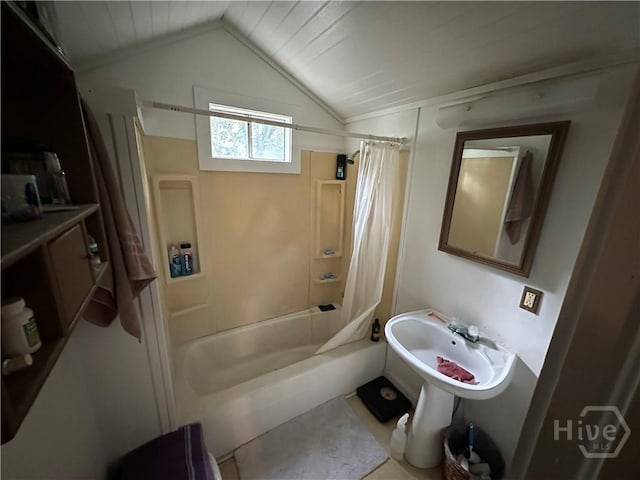 2024 E 50th St, Savannah, GA 31404 - full bath featuring shower / bath combo with shower curtain and vaulted ceiling