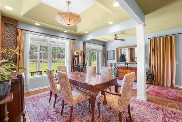 2441 Bovine Rd, Sylvania, GA 30467 - dining space with wood finished floors, recessed lighting, a ceiling fan, and a raised ceiling