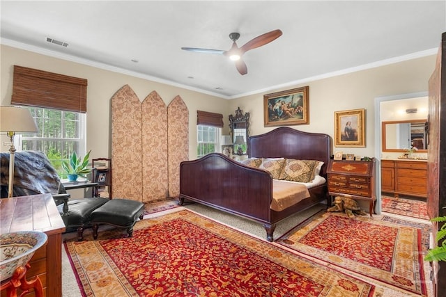 2441 Bovine Rd, Sylvania, GA 30467 - bedroom featuring crown molding, ensuite bathroom, and ceiling fan