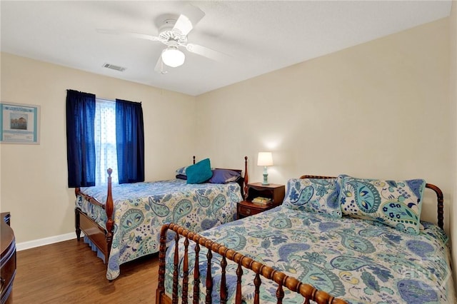119 Catalina Dr, Tybee Island, GA 31328 - bedroom featuring wood finished floors and a ceiling fan
