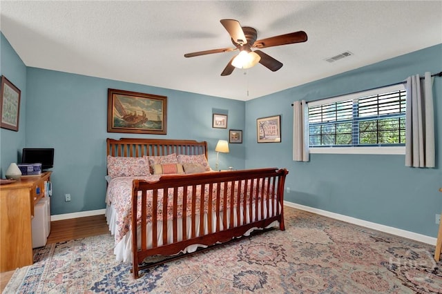 119 Catalina Dr, Tybee Island, GA 31328 - bedroom featuring baseboards and a ceiling fan
