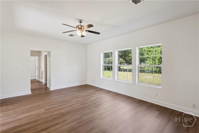 25 SE Cutters Gap, Ludowici, GA 31316 - empty room featuring a ceiling fan and dark wood-style flooring