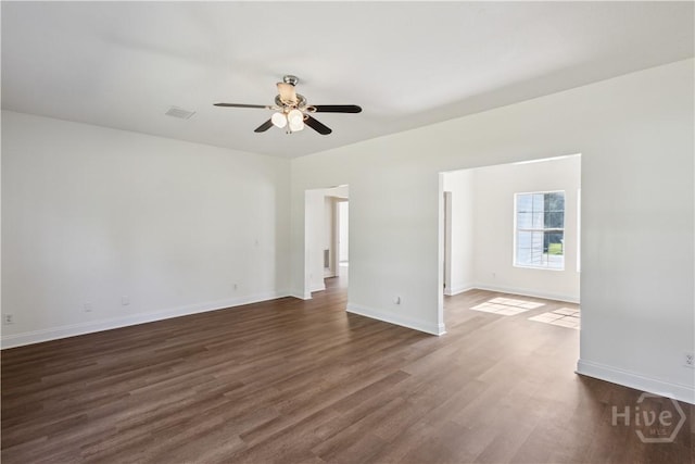 25 SE Cutters Gap, Ludowici, GA 31316 - empty room with a ceiling fan and dark wood-type flooring