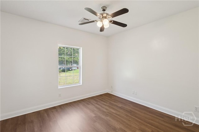 25 SE Cutters Gap, Ludowici, GA 31316 - unfurnished room featuring dark wood-style floors and a ceiling fan