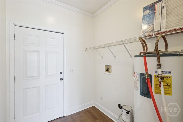 25 SE Cutters Gap, Ludowici, GA 31316 - washroom with water heater, dark wood-style flooring, ornamental molding, and washer hookup