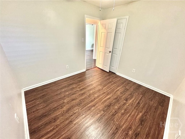 2210 Mosley St, Savannah, GA 31404 - unfurnished room featuring dark wood-style floors and baseboards