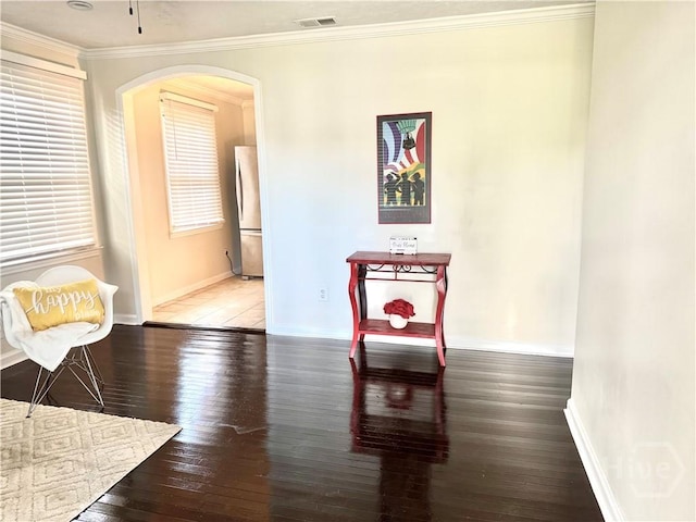 2210 Mosley St, Savannah, GA 31404 - dining space with arched walkways, wood-type flooring, and ornamental molding