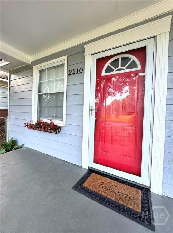 2210 Mosley St, Savannah, GA 31404 - view of exterior entry with a porch