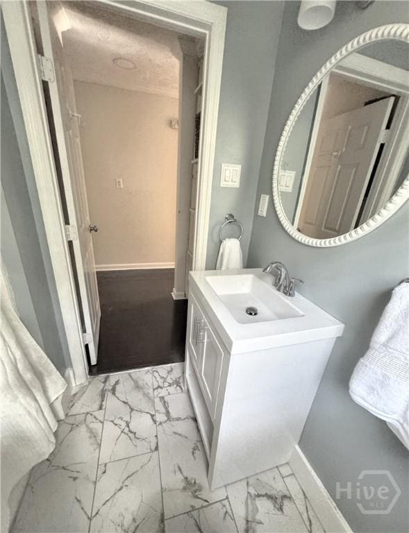 2210 Mosley St, Savannah, GA 31404 - bathroom featuring vanity and marble look tiles