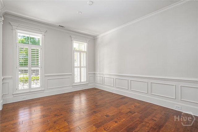 83 Waterway Dr, Savannah, GA 31411 - unfurnished room with plenty of natural light, crown molding, dark wood finished floors, and wainscoting