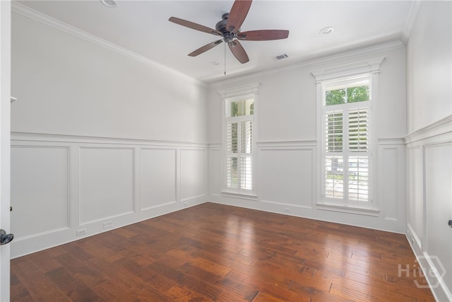 83 Waterway Dr, Savannah, GA 31411 - unfurnished room featuring a decorative wall, ceiling fan, dark wood-style floors, crown molding, and a wainscoted wall