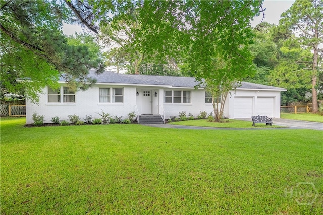 397 Hunt Dr, Savannah, GA 31406 - ranch-style house with driveway, an attached garage, and brick siding