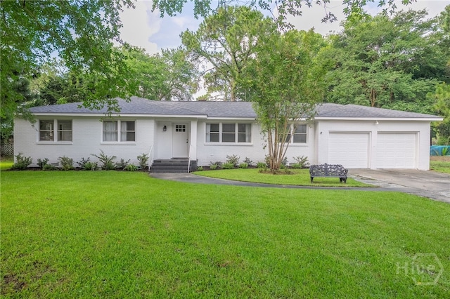 397 Hunt Dr, Savannah, GA 31406 - single story home featuring an attached garage, driveway, a front lawn, and brick siding