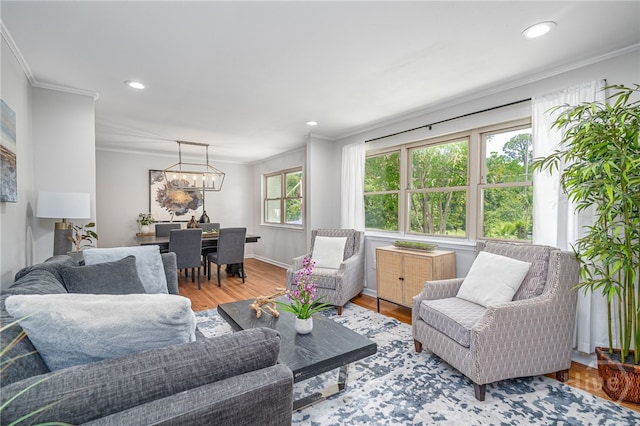 397 Hunt Dr, Savannah, GA 31406 - living area featuring crown molding, a chandelier, recessed lighting, and wood finished floors
