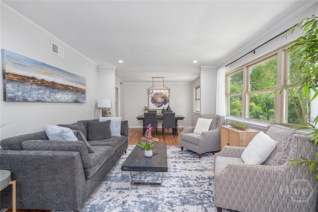 397 Hunt Dr, Savannah, GA 31406 - living room with a chandelier, wood finished floors, crown molding, and recessed lighting