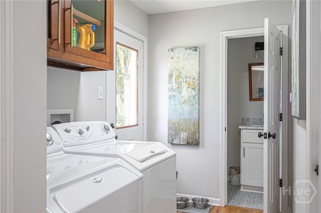 397 Hunt Dr, Savannah, GA 31406 - laundry area featuring cabinet space and washing machine and dryer
