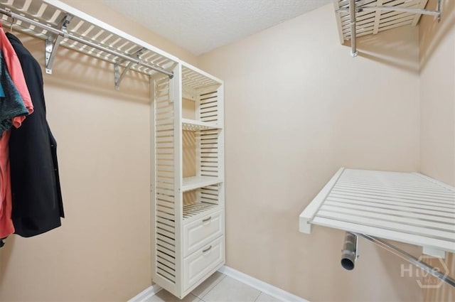 275 Carter St, Richmond Hill, GA 31324 - walk in closet with light tile patterned flooring