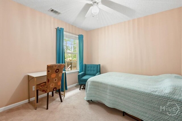 275 Carter St, Richmond Hill, GA 31324 - bedroom with carpet floors and ceiling fan