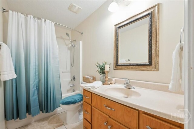 275 Carter St, Richmond Hill, GA 31324 - bathroom featuring vanity, shower / bath combination with curtain, and tile patterned flooring
