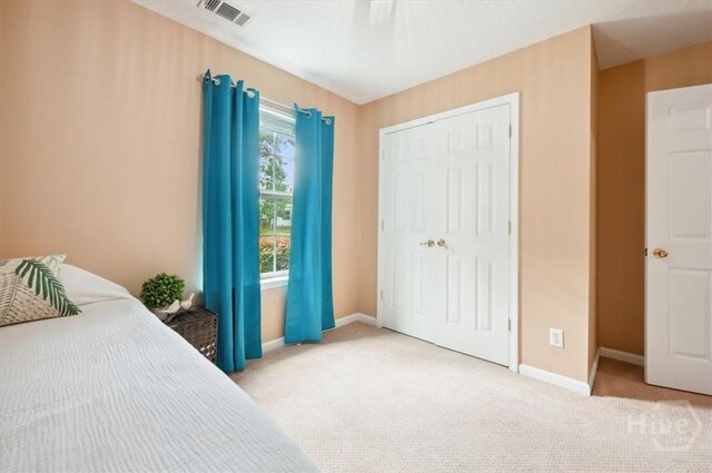 275 Carter St, Richmond Hill, GA 31324 - carpeted bedroom featuring a closet