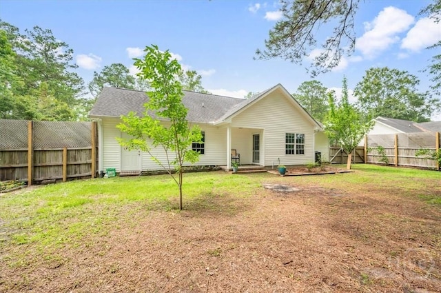 275 Carter St, Richmond Hill, GA 31324 - back of property with a fenced backyard and a shingled roof