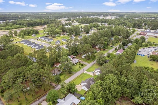 275 Carter St, Richmond Hill, GA 31324 - aerial view of property's location featuring nearby suburban area and a tree filled landscape
