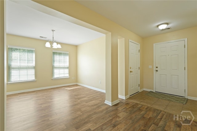 31 Cottingham Way, Pooler, GA 31322 - foyer entrance with wood finished floors and a chandelier