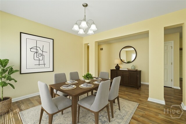 31 Cottingham Way, Pooler, GA 31322 - dining area with a chandelier and wood finished floors