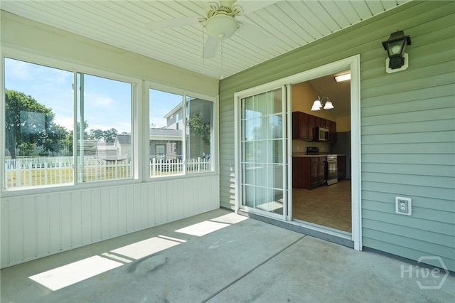 31 Cottingham Way, Pooler, GA 31322 - unfurnished sunroom with a ceiling fan and a chandelier