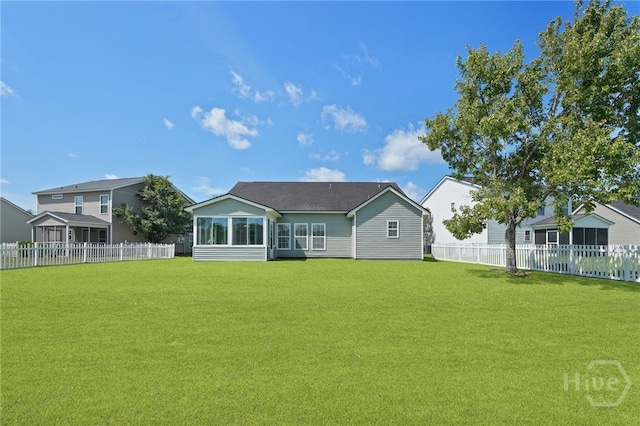 31 Cottingham Way, Pooler, GA 31322 - rear view of house with a sunroom and a fenced backyard