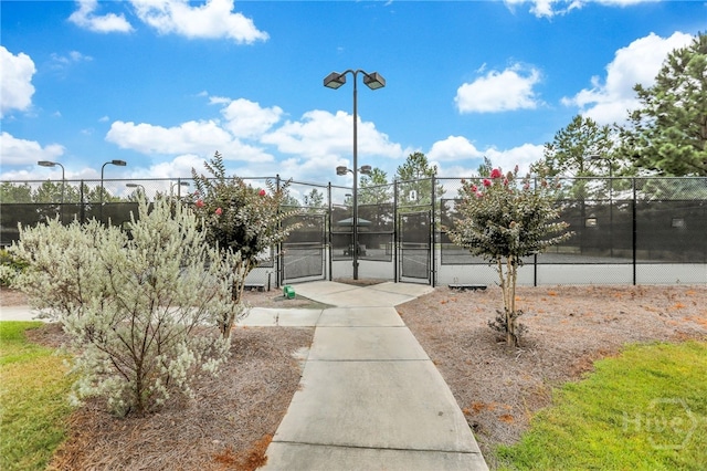 31 Cottingham Way, Pooler, GA 31322 - view of tennis court with a gate